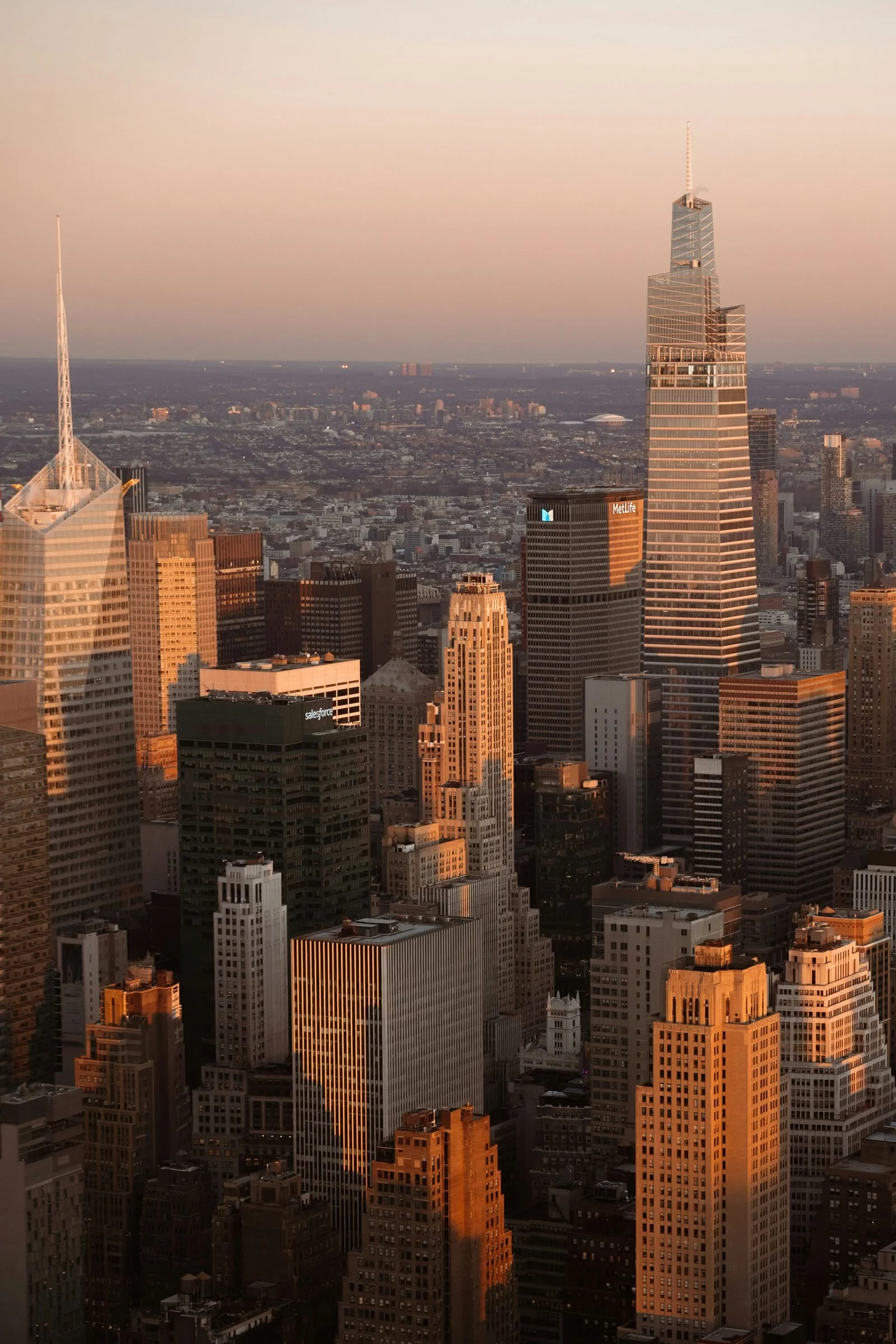 A city skyline in warm evening light